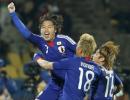 Japan stun Denmark to go through