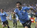 Images: Suarez dream double puts Uruguay through