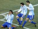 Tevez double puts Argentina in last eight