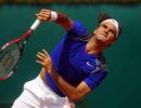 Federer roars through in Monte Carlo clay debut