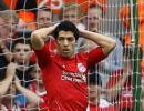 Liverpool's Suarez escapes with one match ban, fine