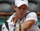 Defending champion Roddick rolls on at Brisbane