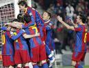 Barca march on at top, Valencia squeeze 4-3 win