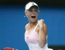 Gritty Wozniacki sees off Schiavone