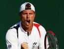 Hewitt soldiers on, Tomic claims biggest win