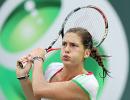 Petkovic upsets Jankovic, Clijsters survives