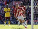 Arsenal's title hopes end with defeat at Stoke