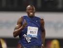 Bolt edges Powell, Americans dominate in Rome