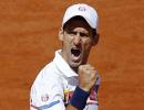 Djokovic battles through to round 4