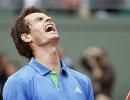 Murray battles past Troicki in rolled-over match