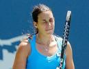 Top seed Bartoli retires injured in Bali