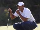 Golf: Tiger Woods takes lead at Australian Open