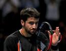 Djokovic left sweating after Tipsarevic shock