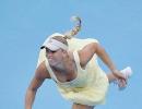 Wozniacki rallies to advance in Beijing