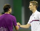 Germany's Mayer stuns Nadal, Murray marches on