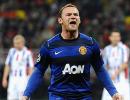 CLeague: Rooney fires United, late Aguero goal seals City win