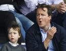 First Look: British PM Cameron at English Premier League match