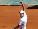 Djokovic switches off from grief to beat Haase