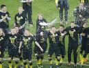 Beer-soaked Dortmund retain Bundesliga title