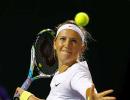 Azarenka advances in Stuttgart, Wozniacki out