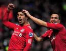 Suarez treble lifts Liverpool, defeat for Newcastle