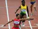 PHOTOS: US breaks 27-year-old record in women's 4x100