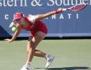 Kerber hands Serena rare loss, advances to semis