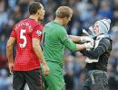 Police charge nine over crowd trouble at Manchester derby