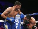 Khan outclasses Molina to register comeback victory