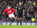 EPL PHOTOS: Rooney on the spot in dramatic United fightback