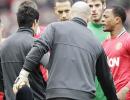 Suarez apologises for not shaking Evra's hand