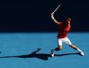 Federer floors Del Potro to enter semis