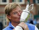 Els wins British Open after late Scott collapse