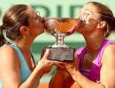 Errani keeps twin title dream alive with doubles victory