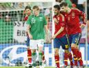 PHOTOS: Spain march on as Irish sing in rain