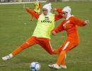 Football body approves goal-line technology, hijab