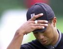 Injured Woods withdraws from WGC