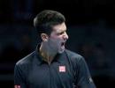 Djokovic fights back to beat Murray at Tour Finals