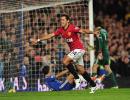 European soocer: United scrape through, Barca rout Rayo