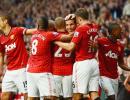 Photos: Van Persie hat-trick seals win for United