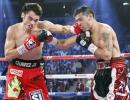 Martinez survives knockdown, beats Chavez