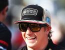 Title contender Raikkonen happy at Lotus, for now