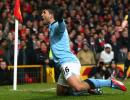 EPL PHOTOS: Special Aguero goal helps City sink United