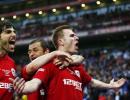 FA Cup: Wigan reach final as Millwall fans fight themselves