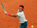 Nadal routs Raonic to close on eighth Barcelona title