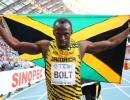 Bolt completes sprint double with ease at world athletics