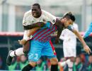 Balotelli helps Milan end chaotic week with win at Catania