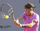 Nadal overcomes slow start to advance in Chile