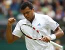 Tsonga saves five match points to knock out Tomic