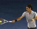 Federer puts journeyman Jaziri in his place after blip